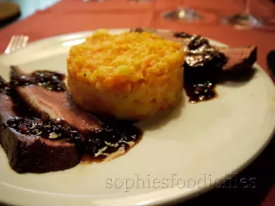 Magret duck breast with a cassis & raspberry sauce served with a parsnip & carrot mash